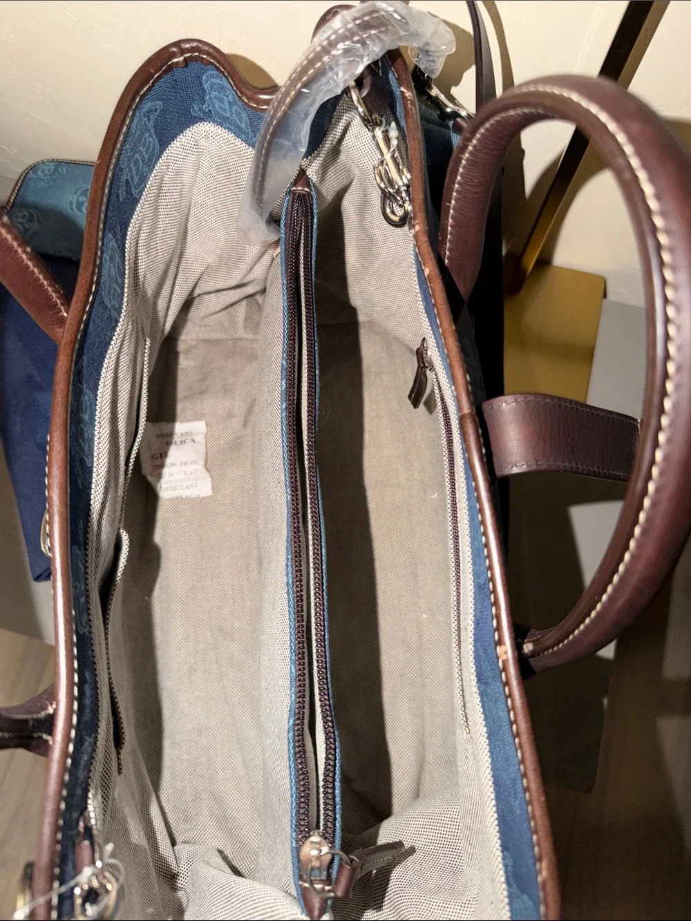 Dooney & Bourke Blue Canvas Duffel with Brown Leather Trim